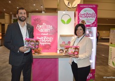 Stephen Cowan and Emily Murracas with Mucci Farms are proud to show the company's new package of strawberries with chocolate or cheesecake flavored dip.